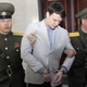 American student Otto Warmbier, center, is escorted at the Supreme Court in Pyongyang, North Korea, on March 16, 2016. (AP Photo/Jon Chol Jin)